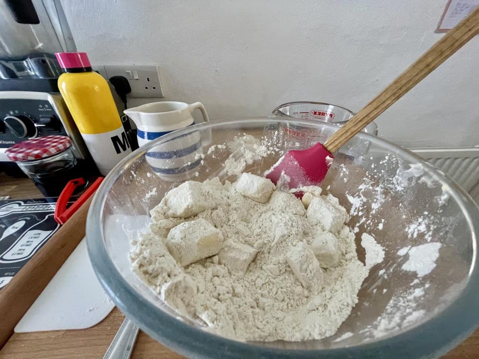 Flour and butter in the process of being mixed