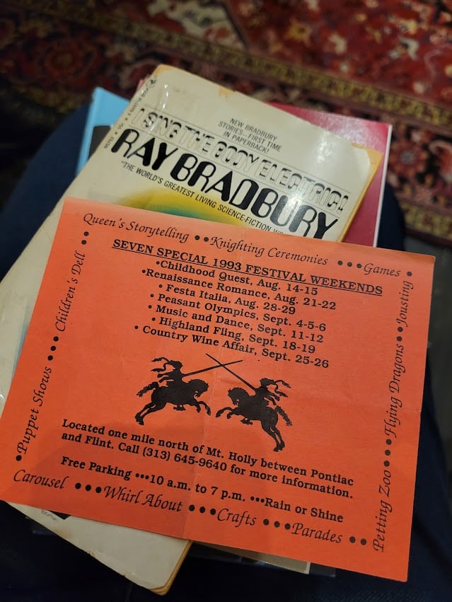 a Michigan Renaissance Faire advertisement from 1993, found faded and crinkled in an old paperback book. Items range from Peasant Olympics to Highland Fling...