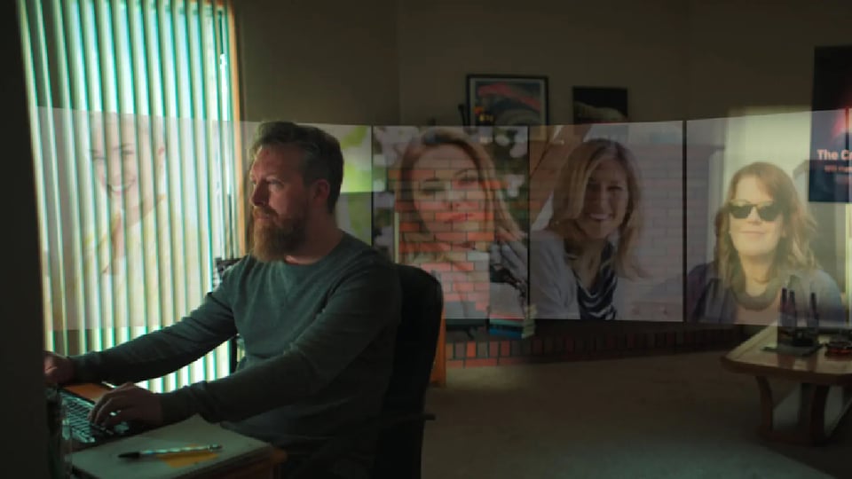 Man seated at computer