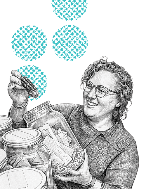 Vivian holds a canister of seeds