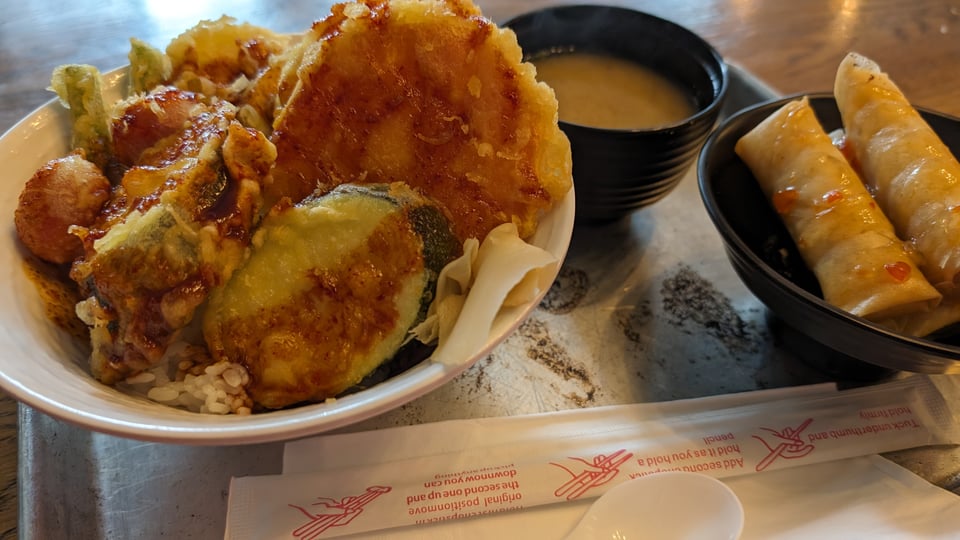 Vegetable tendon, a tempura dish served over rice with miso soup.