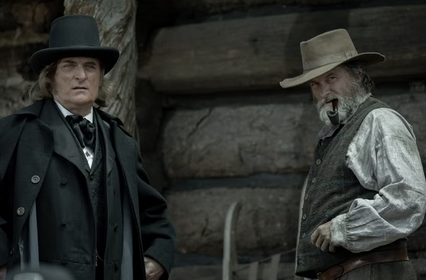 actors Kim Coates and Shea Whigham dressed in 1870s period garb in the tv show American Primeval.