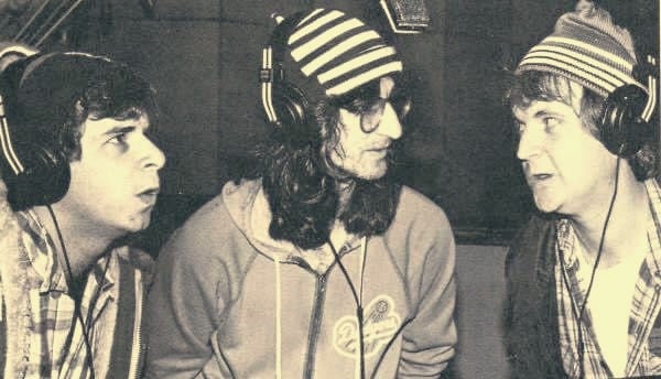 Bob McKenzie (Rick Moranis), Geddy Lee and Doug McKenzie (Dave Thomas) in the recording studio in 1981.