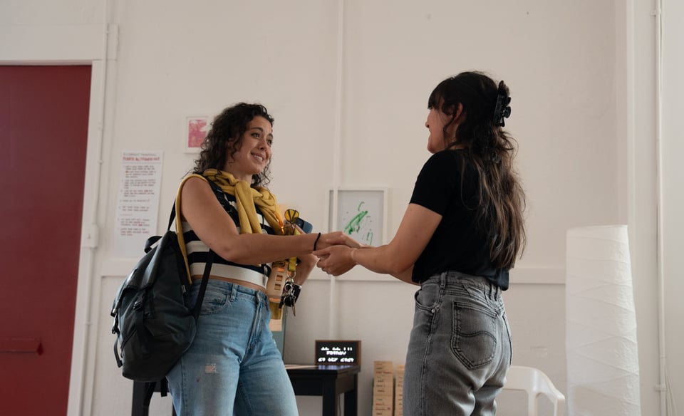Allyson and Livvy greeting each other.