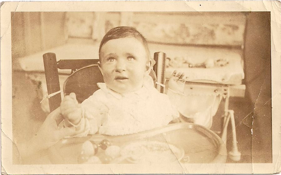 cute baby in vintage sepia-toned photo, circa 1935
