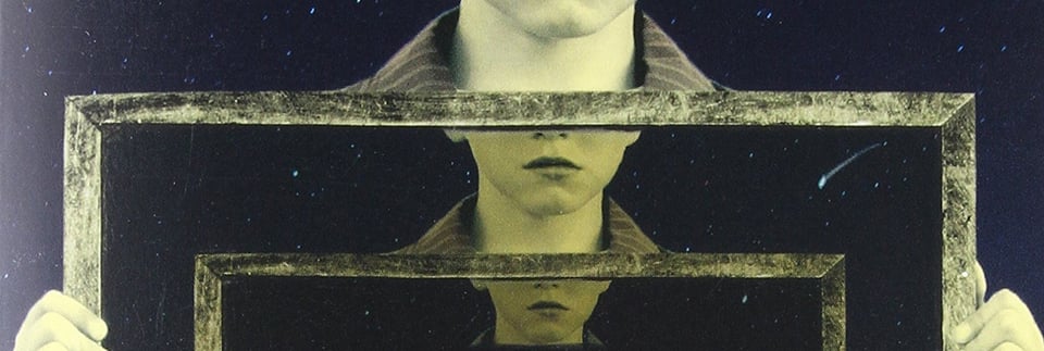 a section of the cover of The First Fifteen Lives of Harry August, showing a series of concentric picture frames with a young boy's face obscured