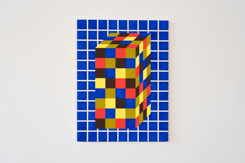 Vertical painting of double-high Rubik's cube against blue tiled background
