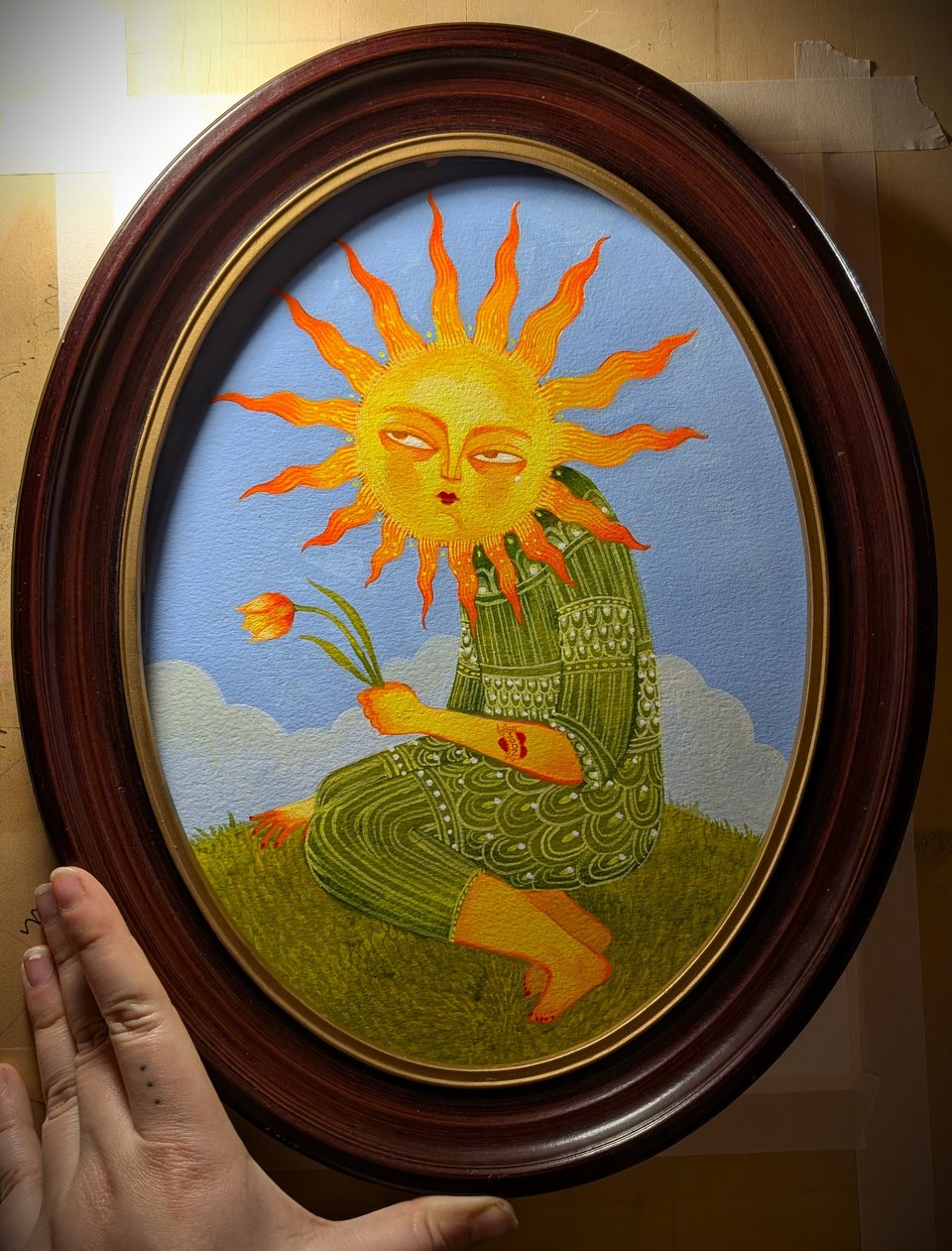 painting of a sun being