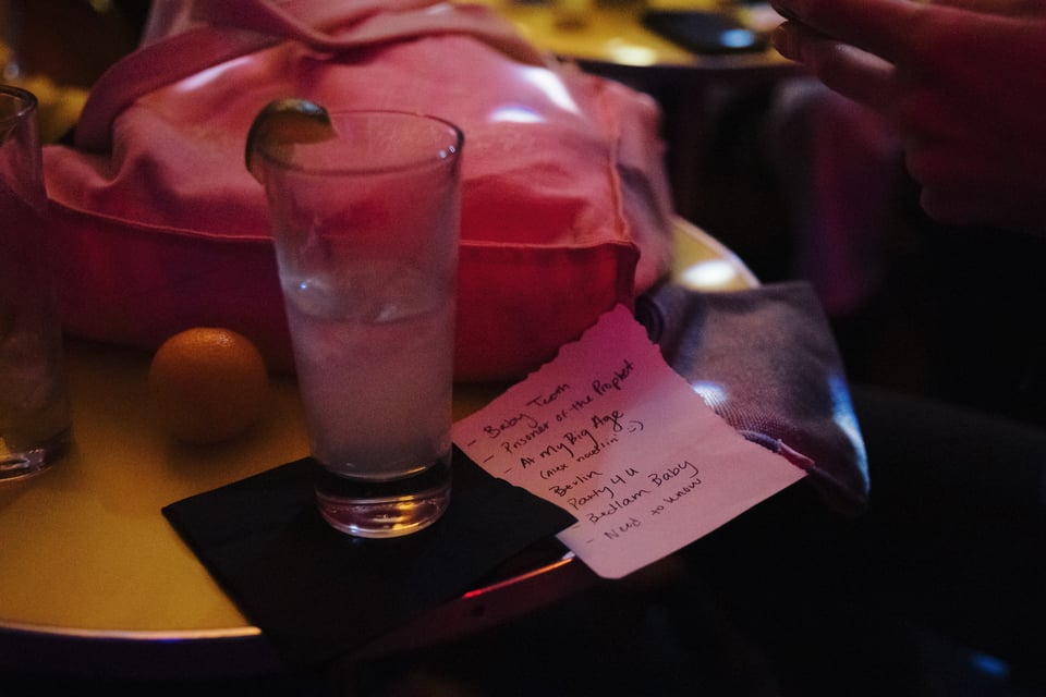 a mostly pink image showing a list of songs from Taylor Pearlstein's set at Cassette on Nov 25