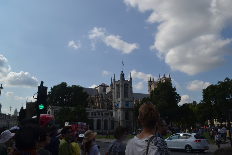 A view across a road to two churches, one small, one rather large.