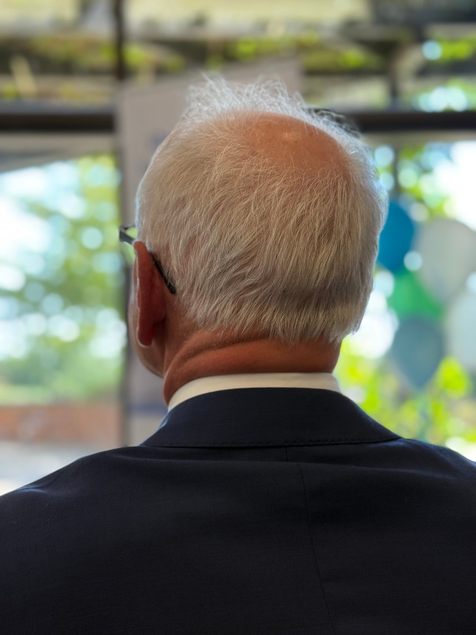 photo of the back of Gov. Tim Walz' head
