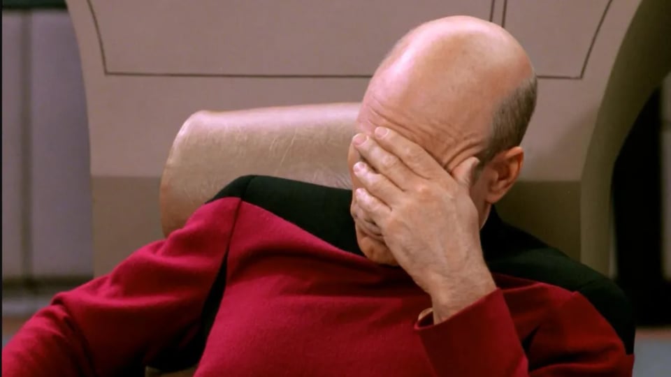 Captain Jean-Luc Picard with his face in his palm.