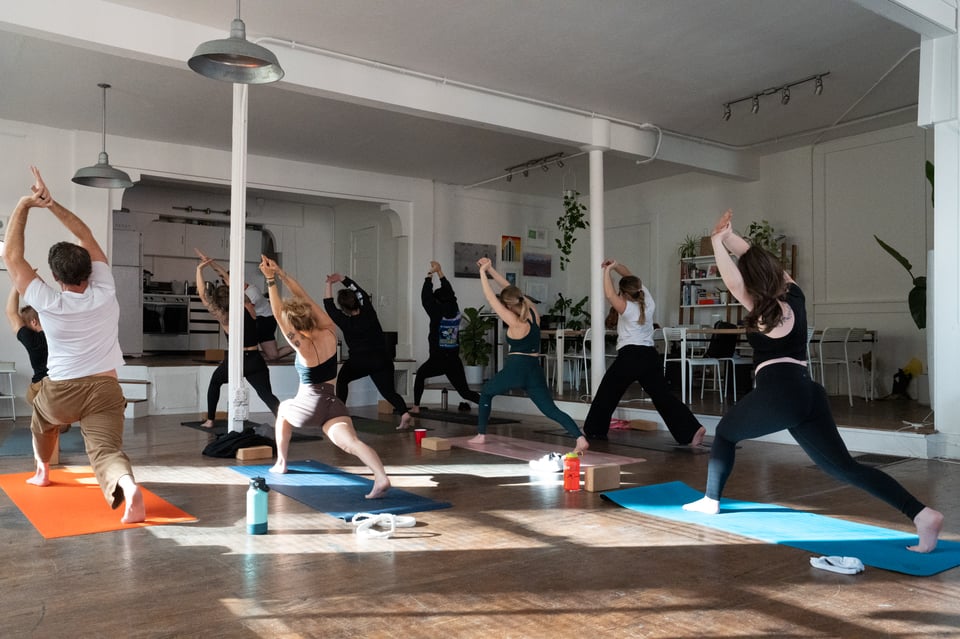 People doing yoga (with Sam!)