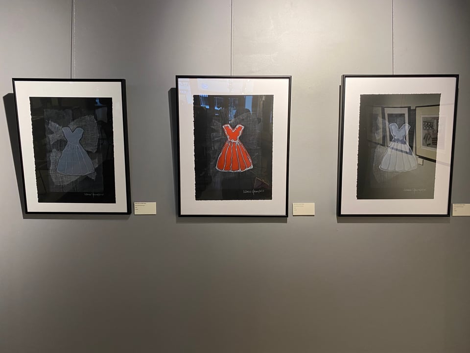three prints each with black background and the same form of an a-frame dress in different colors, art by Laura Youngbird