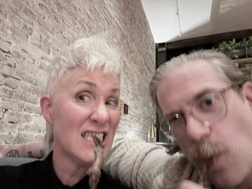 Me and Rob Hart, very blurry and stuffed, chewing on smoked squab bones. Like one does.