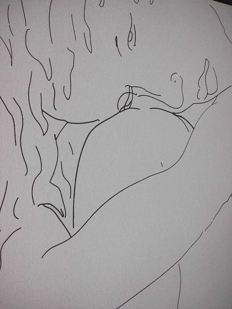 Instax photo: detail of a drawing by Barbara Nessim, of a seated woman with her arms around her shins and her head resting on her knee