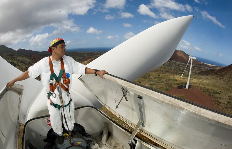 Standing on one wind turbine to visual inspect another wind turbine