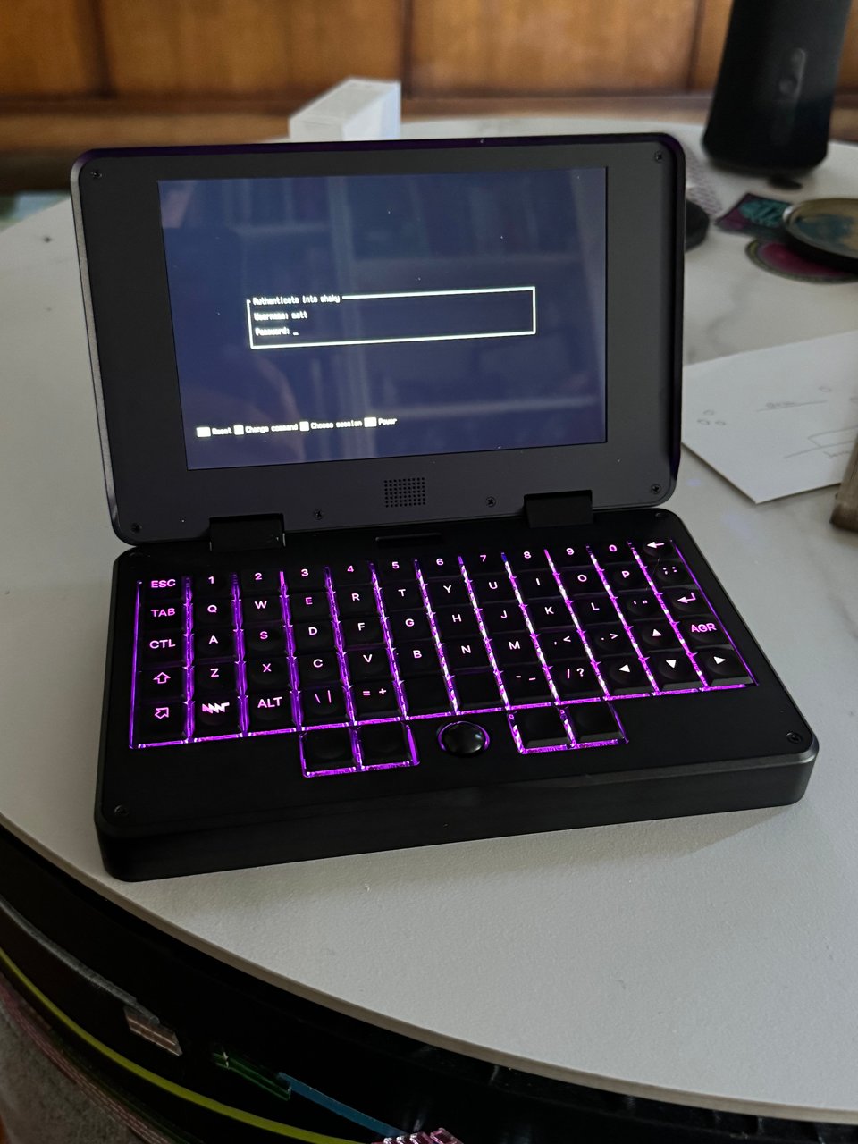 A photo of a miniature laptop, the Pocket Reform.