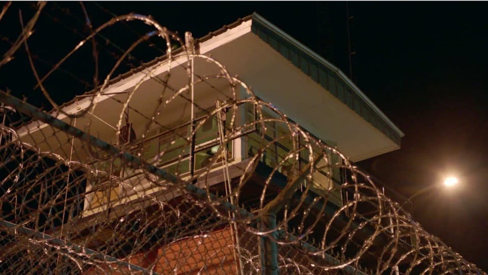 barbed wire and prison fence