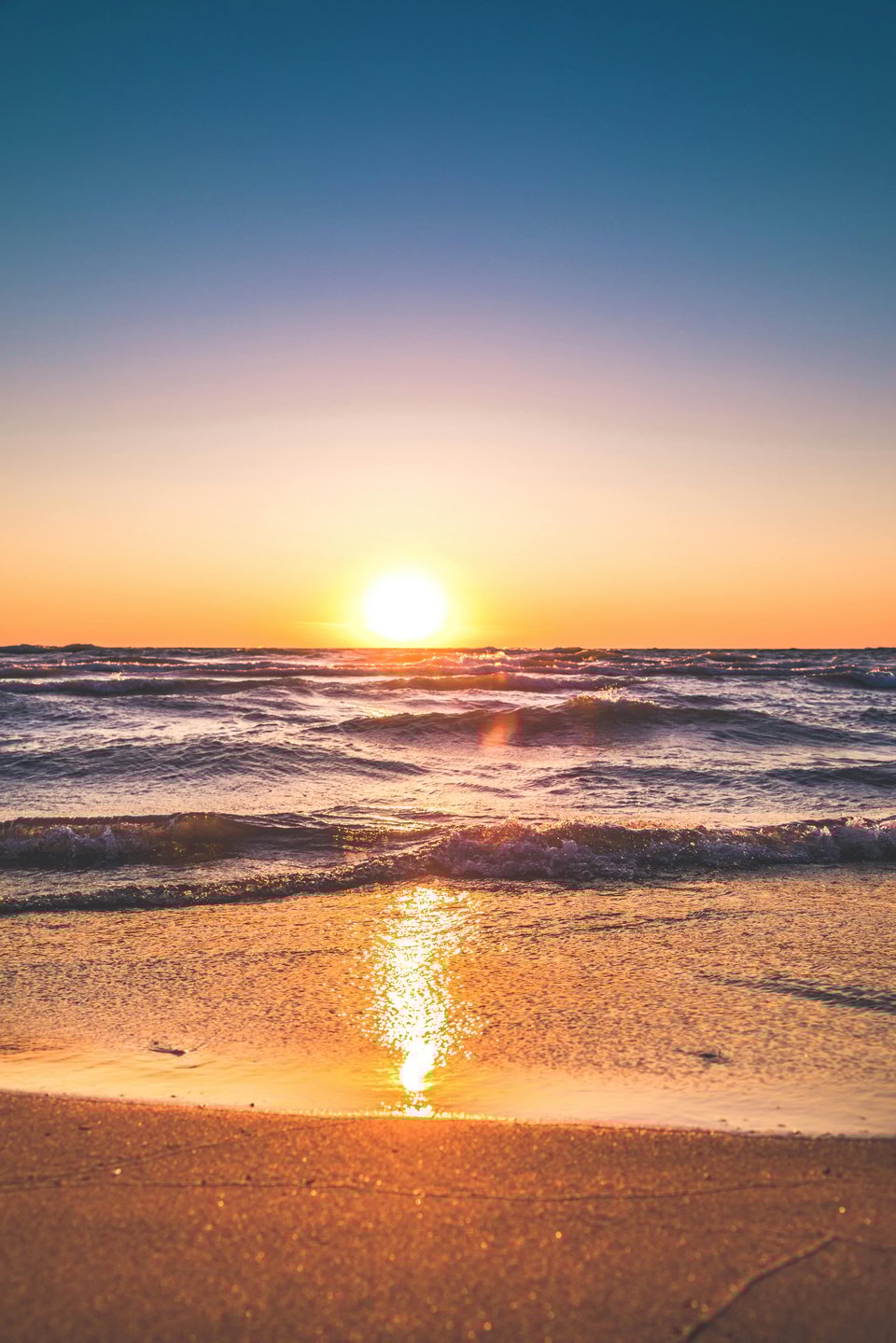Stock image of a sunset at the beach.