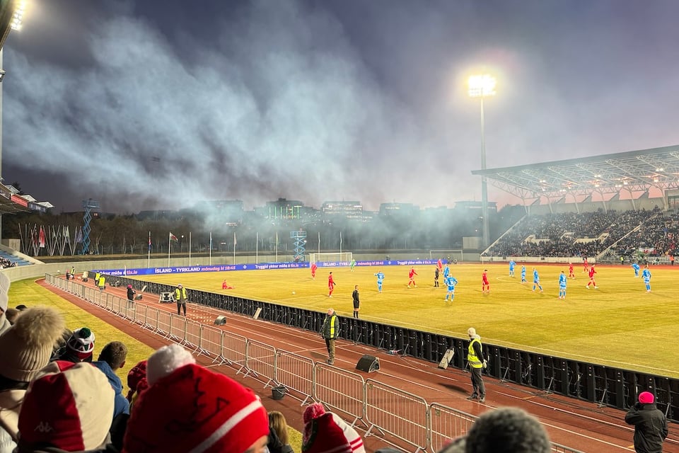 A misty football stadium in Reyjavik. Iceland are playing Wales.