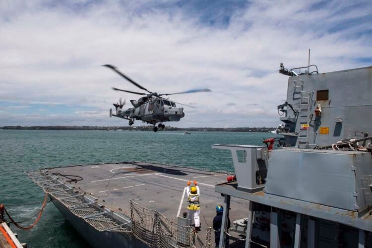 US military helicopter lands on ship