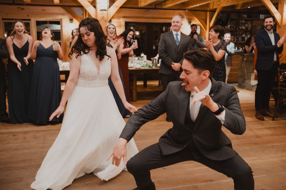 a bride and groom dancing at their wedding reception
