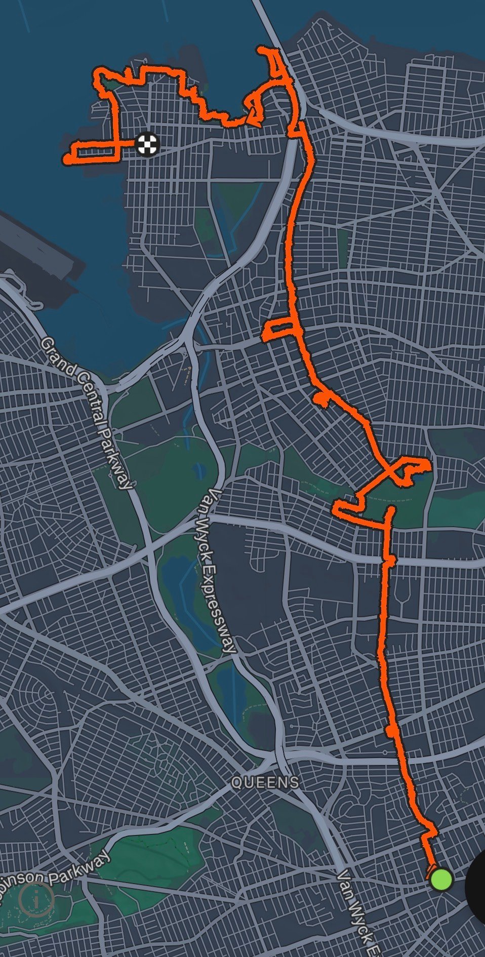 A map of our walk through Queens, a bright orange line on a grey-on-grey grid