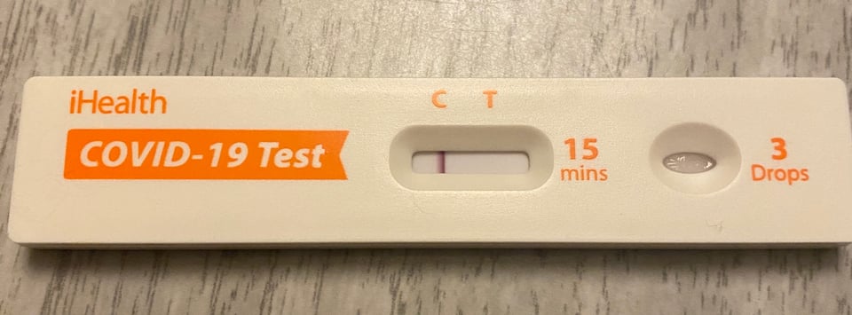 An at-home covid test showing no trace of covid