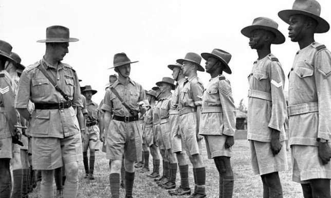 Nigerian Recruits being inspected by British commanders.