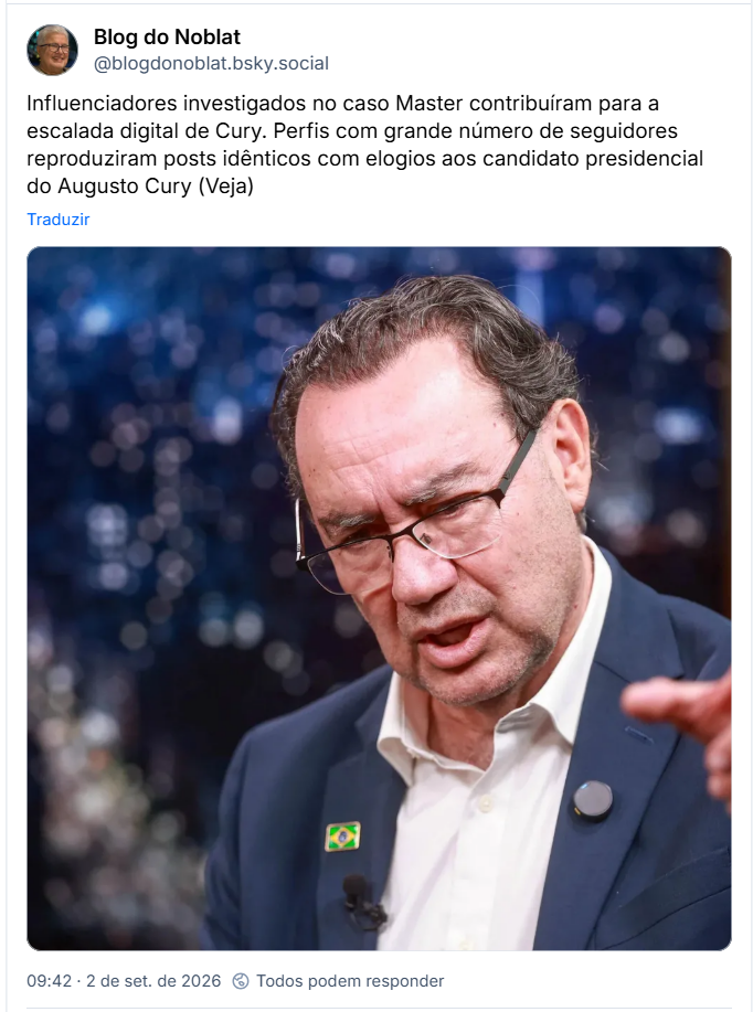 Post de Blog do Noblat (@blogdonoblat.bsky.social): Influenciadores investigados no caso Master contribuíram para a escalada digital de Cury. Perfis com grande número de seguidores reproduziram posts idênticos com elogios aos candidato presidencial do Augusto Cury (Veja) (post contém fotografia do candidato)