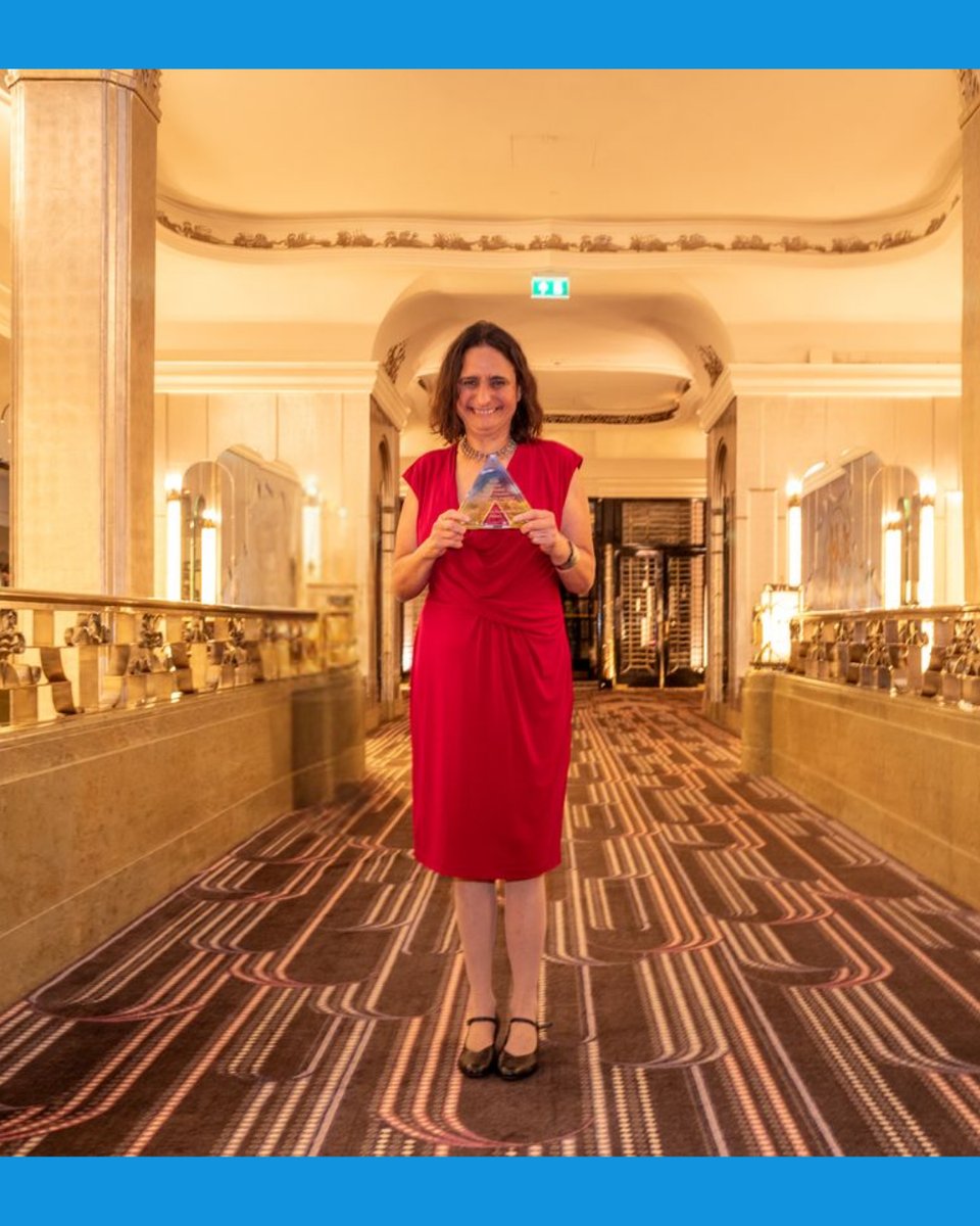 Giovanna with REA Award