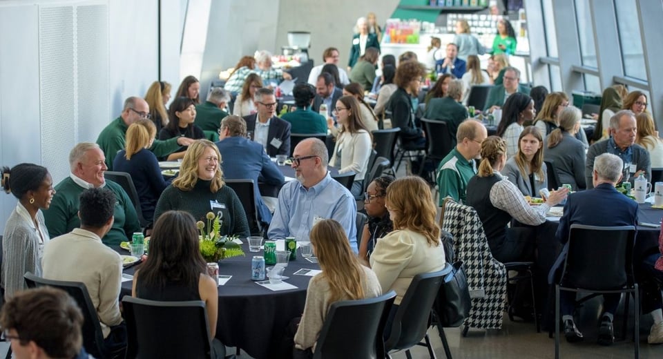Photo shows a reception of students, alumni and college leadership inside the Broad Art Museum.