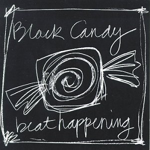 A blackboard. In chalk, "Black Candy" is written on the top and "beat happening" on the bottom. In the middle is a loose sketch of a square piece of candy in a wrapper. It has a sprial shape in the middle of it.