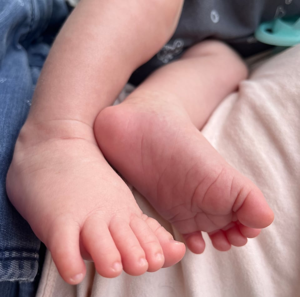 A close-up of my baby's extremely perfect feet