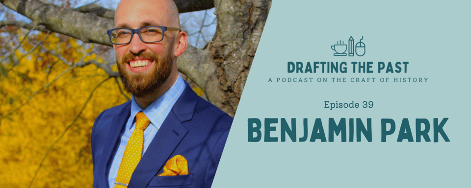 Episode graphic. On the left, an image of a sming bald man with a beard wearing glasses, blue suit jacket, and yellow tie and pocket square. On the right, teal text reads "Drafitng the Past Episode 39, Benjamin Park."