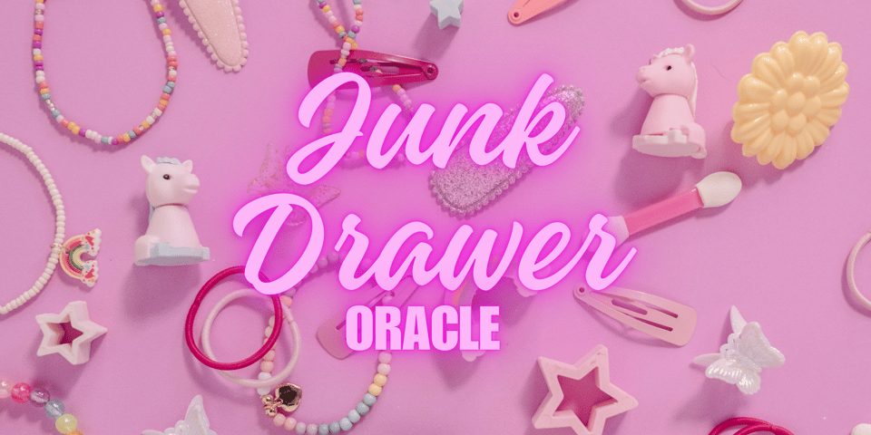 Junk drawer oracle with pictures of little plastic figures and hair clips