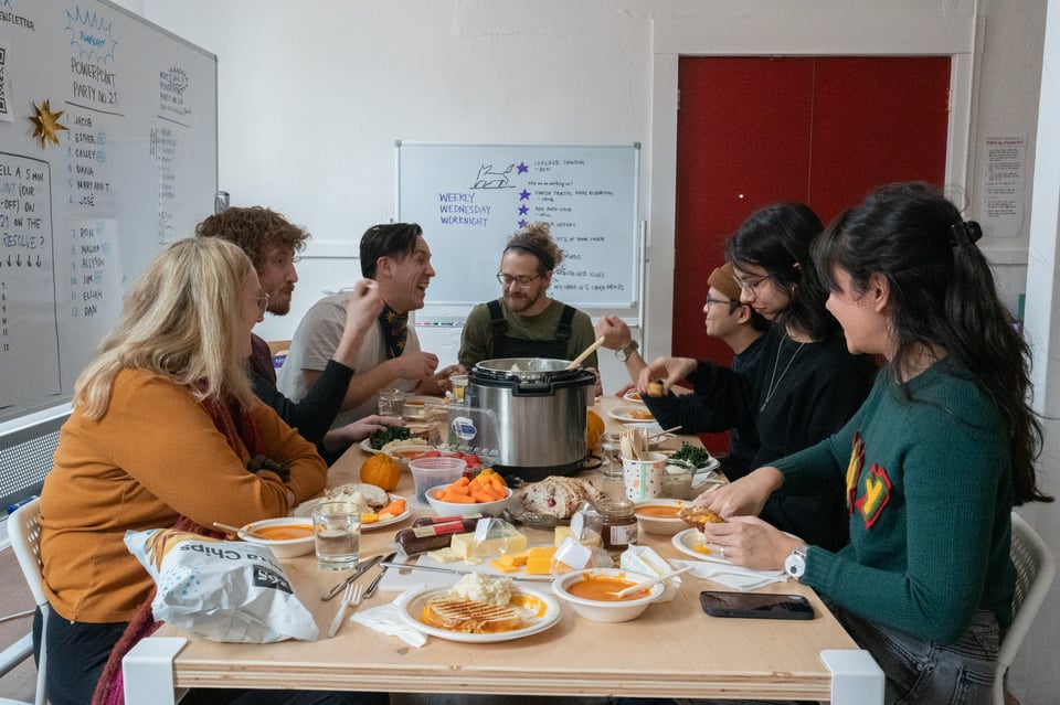 The same group around a different table.