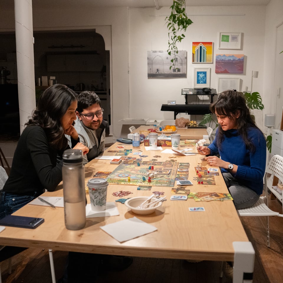 People playing a board game.