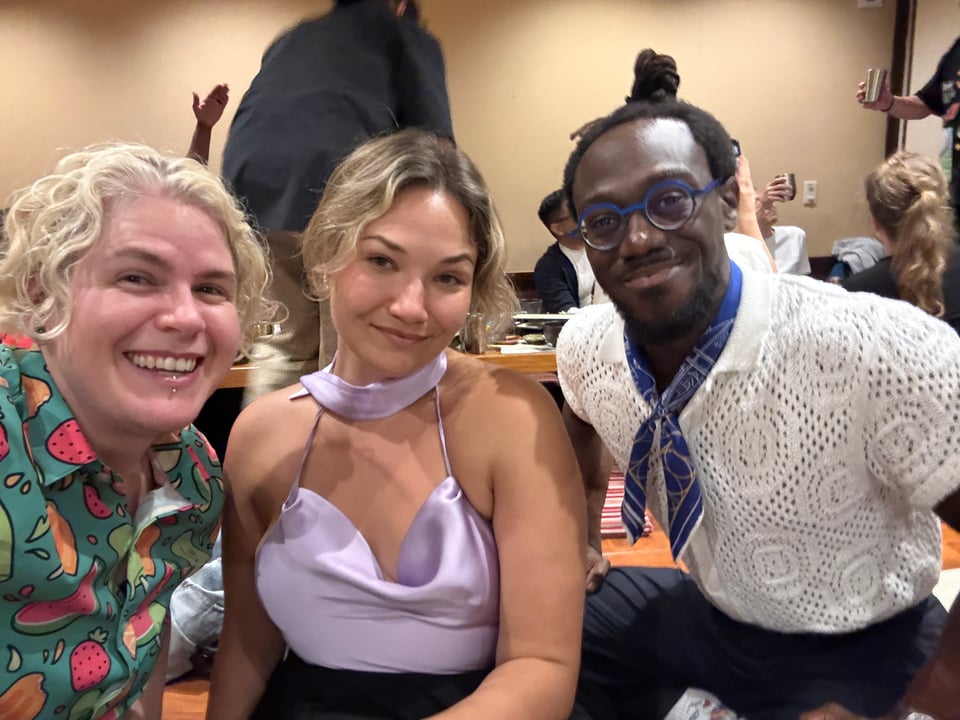 Three people enjoying time together.