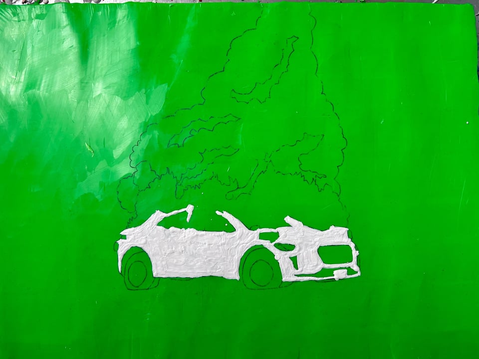 A painting in progress. Vaguely a car, possibly on fire, on a green background.