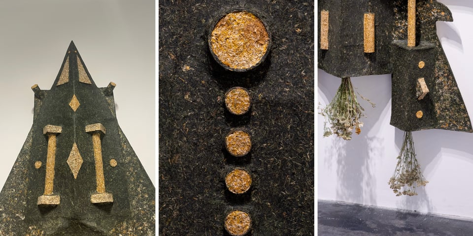 Details of spaceship sculpture in gallery.