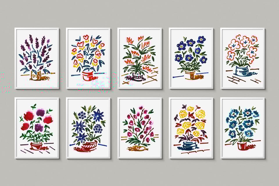 Ten framed ink drawings of flowers on a grey wall