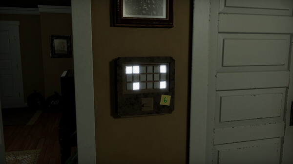 Button pad mounted on a wall. Some of the buttons are lit up.