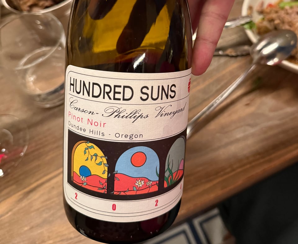 Bottle of Hundred Suns Oregon wine served at a table at Atoboy, New York City