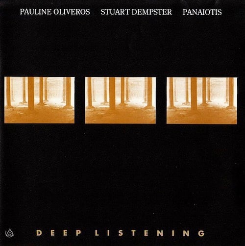 On a black background are three rectangles placed in a row horizonally, all of the same picture. It shows... well it could be a forest, with eight tree trunks. But those trunks could also be cement pylons, and based on the light from above, this could be underwater. In conclusion, I don't know. The pictures are tinted dark orange.