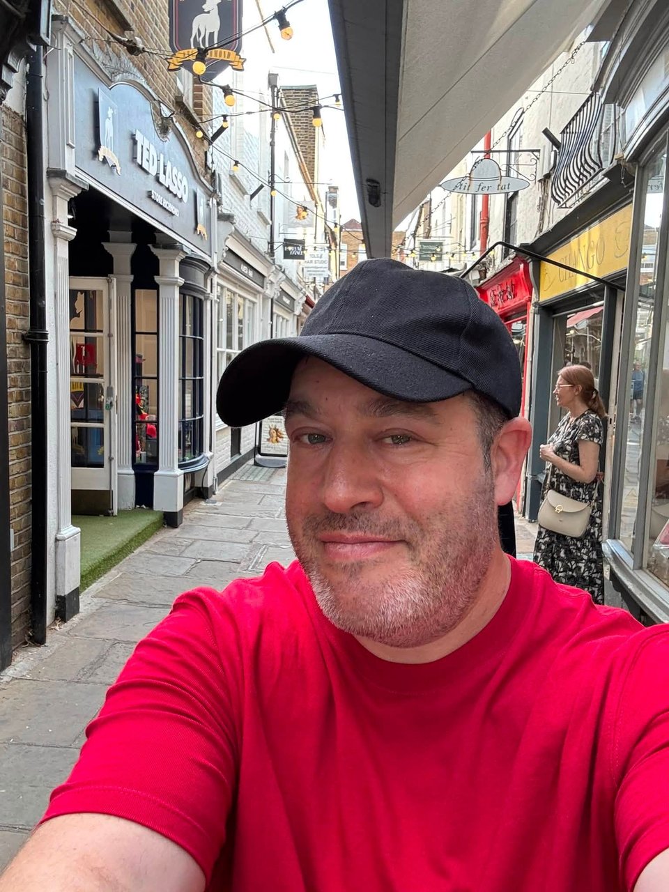 Neil on a lane in Richmond, London, right outside the Ted Lasso store