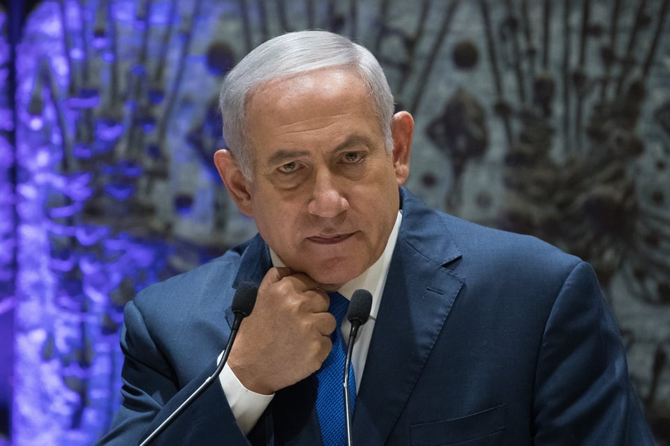 Israel's Prime Minister Benjamin Netanyahu speaks during a ceremony awarding people who donate to the fight against human trafficking at the President's Residence in Jerusalem on December 2, 2018.