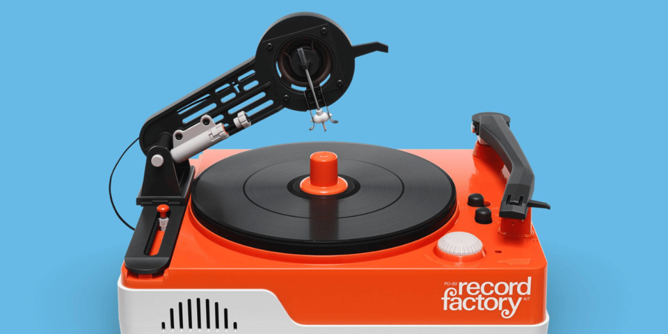 A gorgeous red record player by Teenage Engineering.