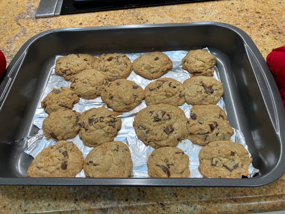 Tray of chocolate chip cookies on foil